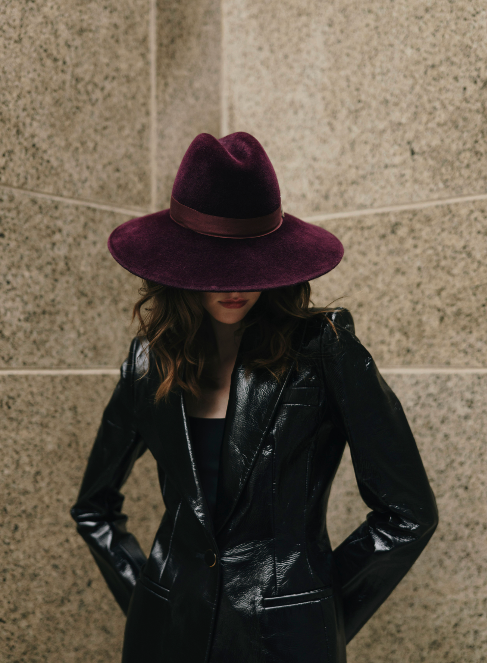 Purple wide-brimmed hat with a band