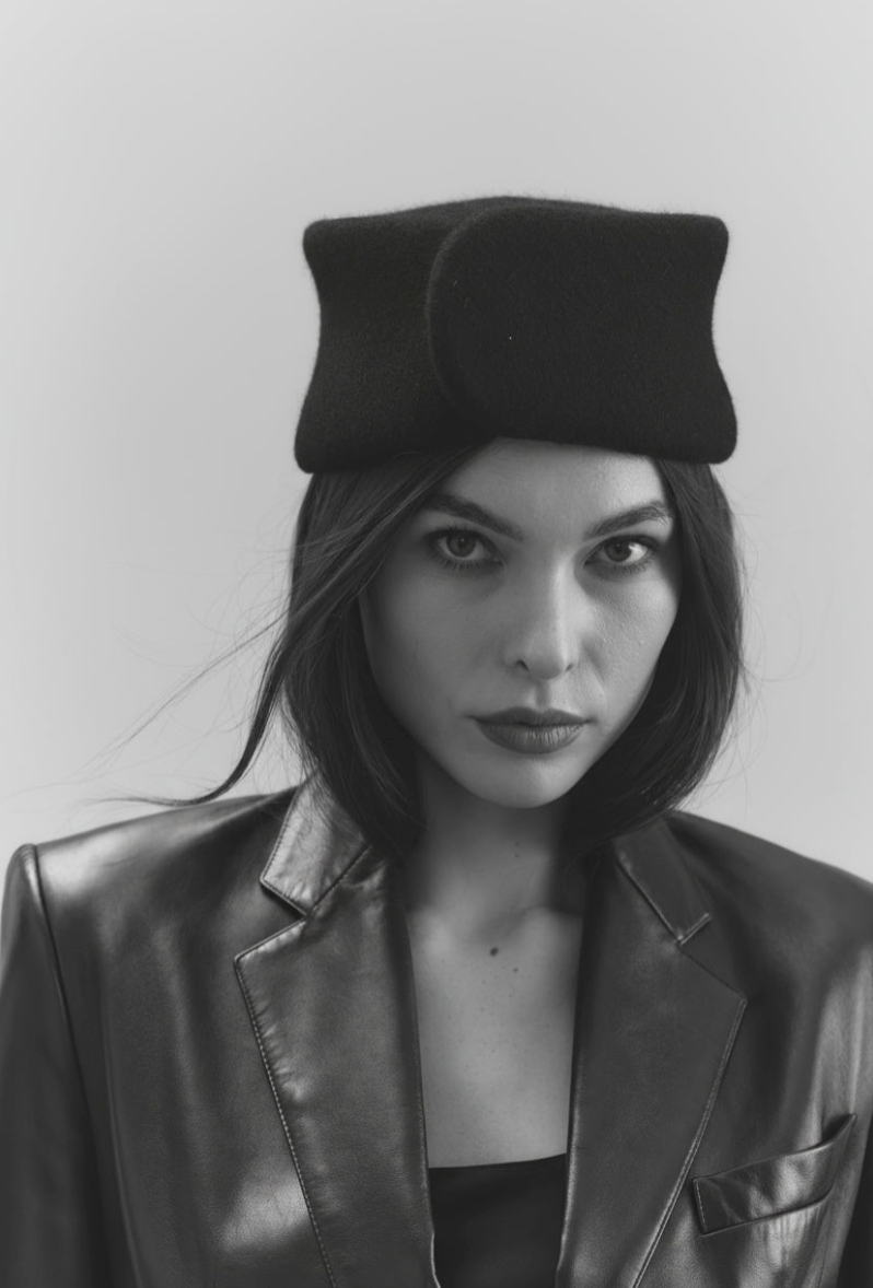 Wool pillbox felt hat on model