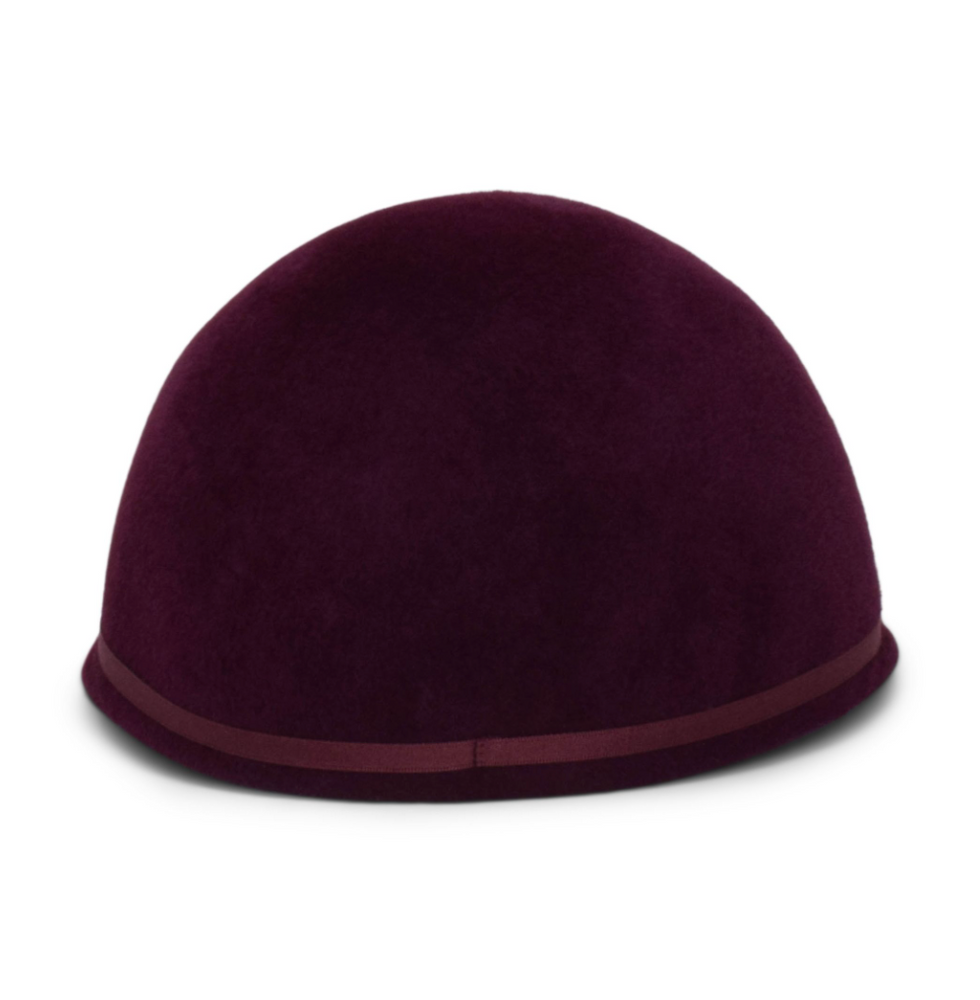 Purple hat with a band on a white background