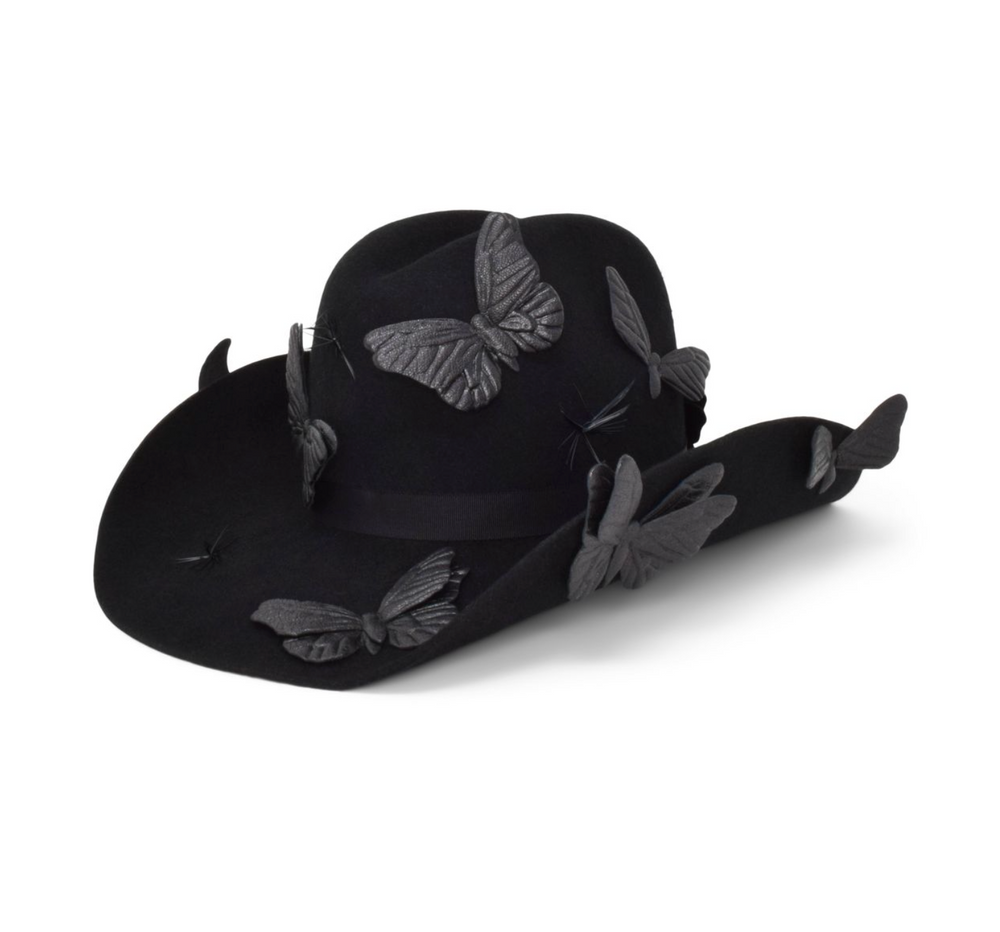 Black cap with butterfly designs on a white background