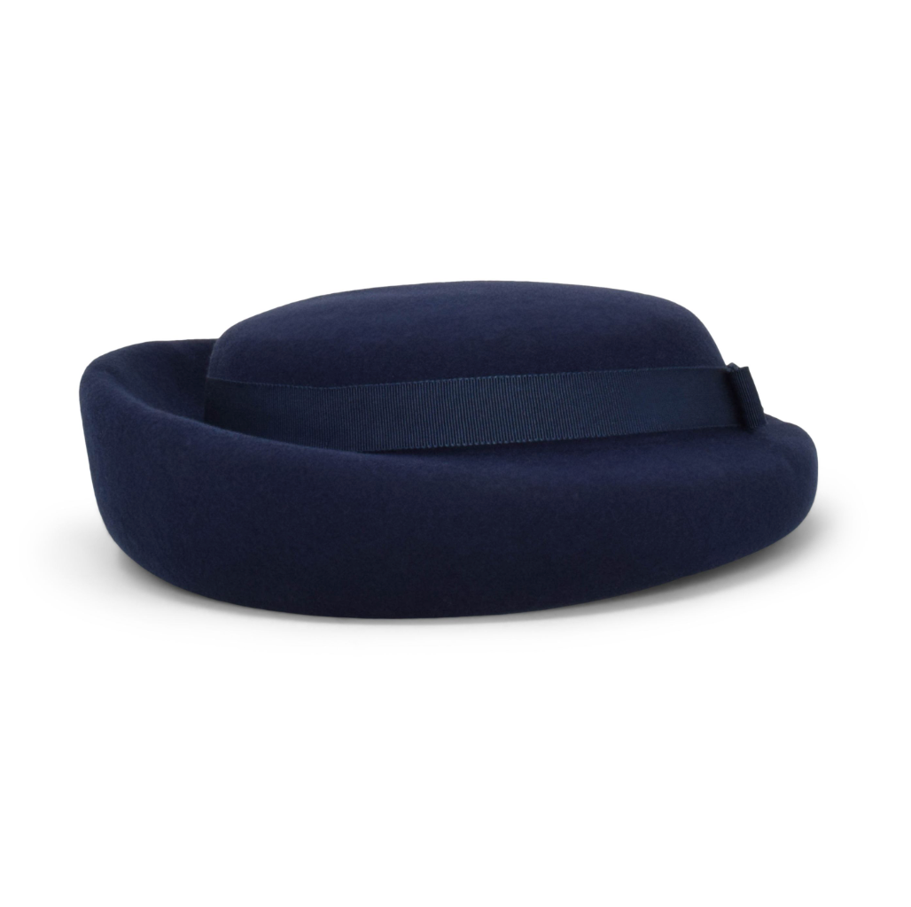 Navy blue travel pillow on a white background