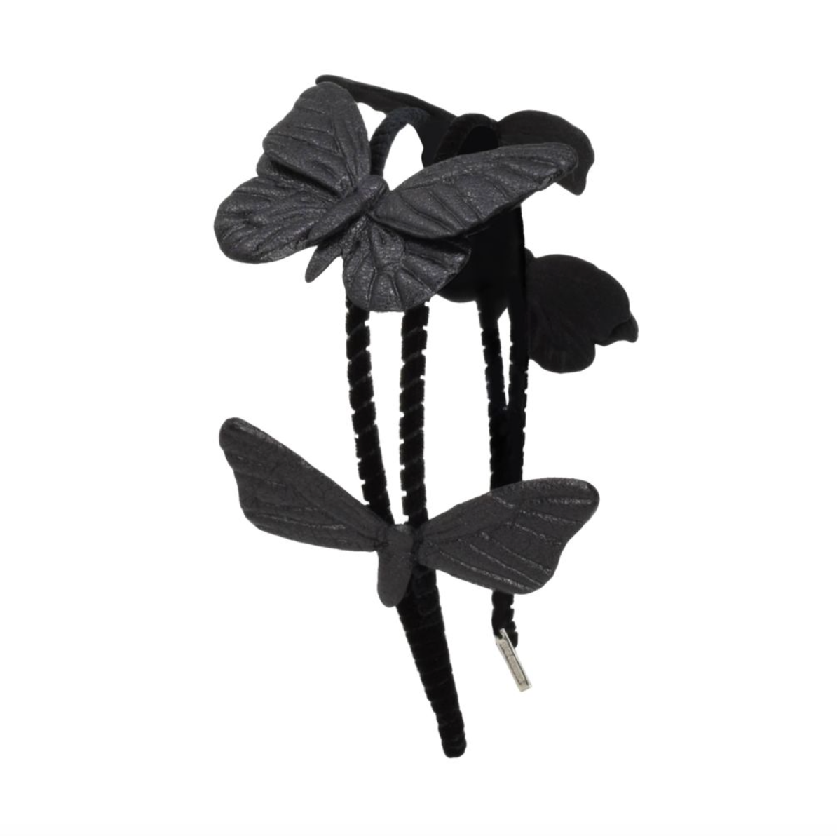 Black butterfly hair clip on a white background