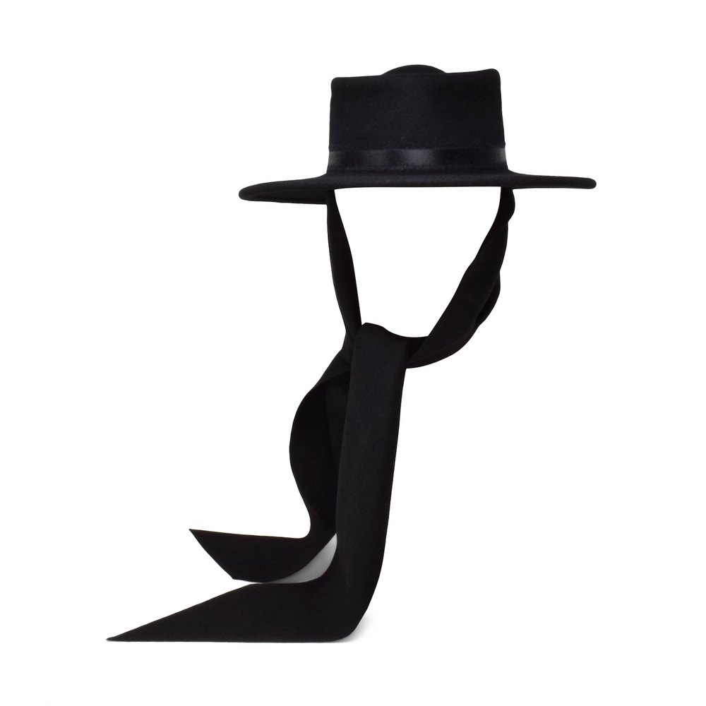 Black hat with a long black bow tie on a white background