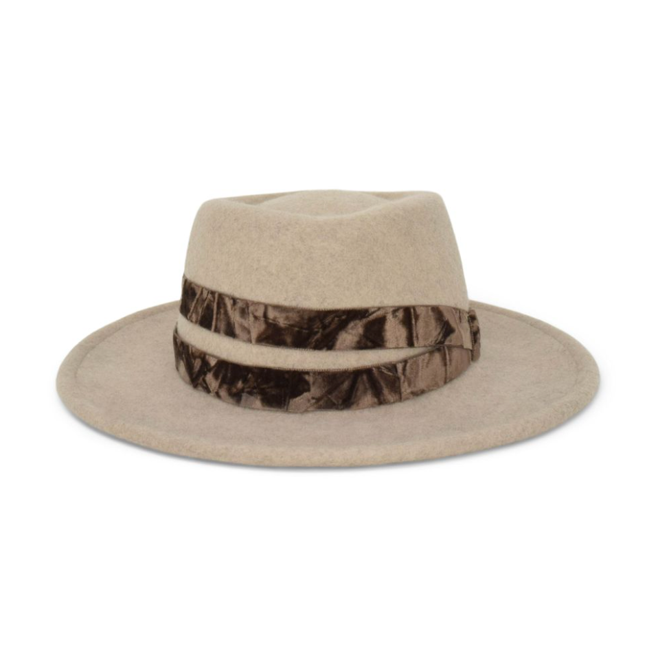 Beige fedora hat with a decrotive band 