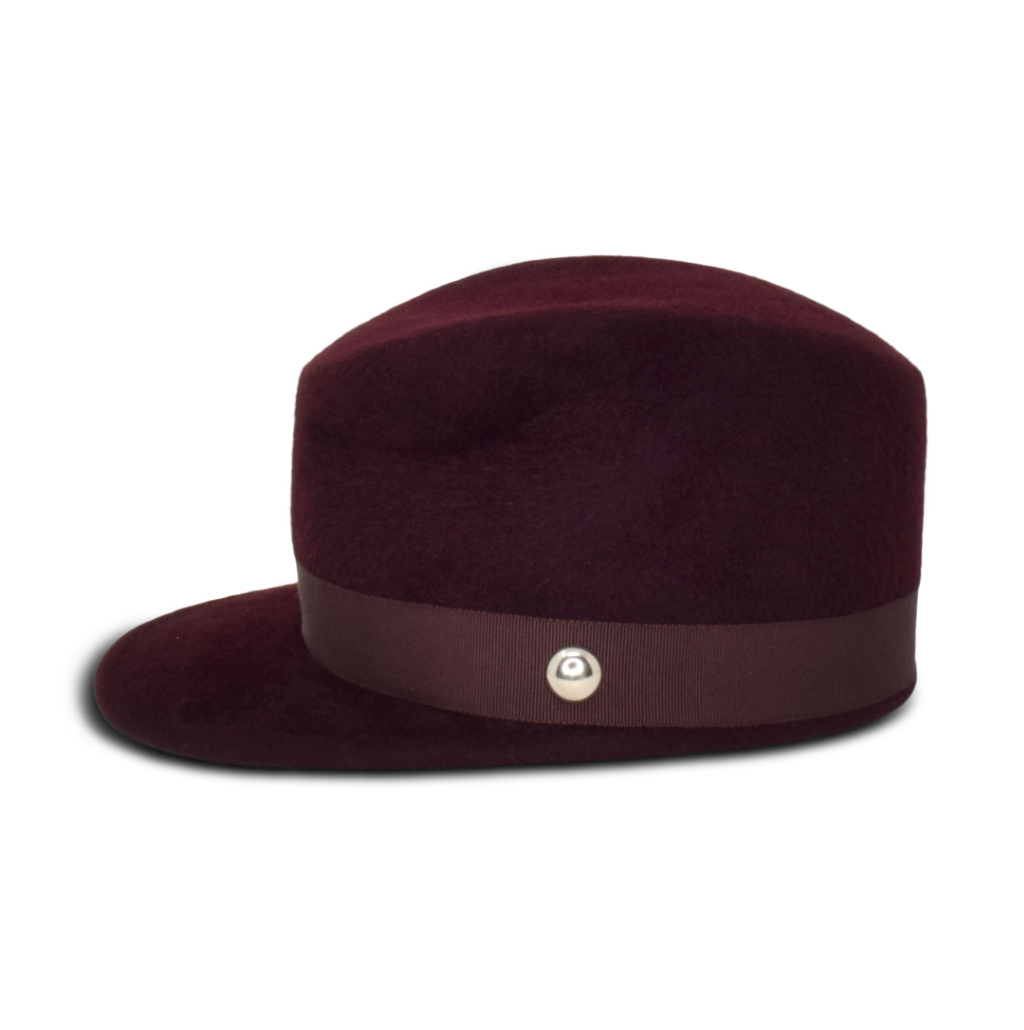 Brown hat with a band and button on a white background