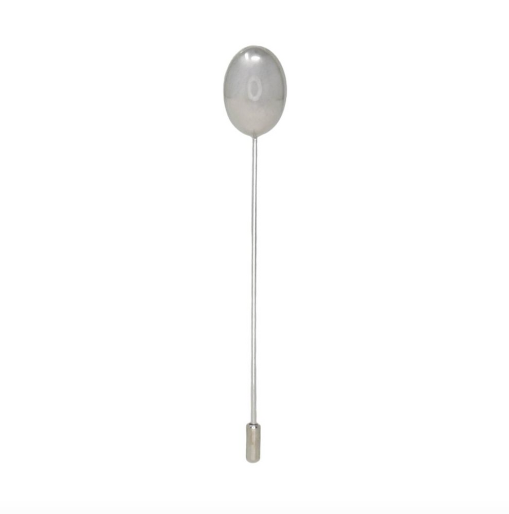 Silver balloon weight with a string on a white background
